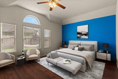 What a wonderful place to come home to, this stunning primary suite greets you with gorgeous floors, warm custom paint, high ceiling, ceiling fan with lighting, large windows with blinds allowing in natural light brightening up this spacious primary bedroom, with extra space for a seating area.
