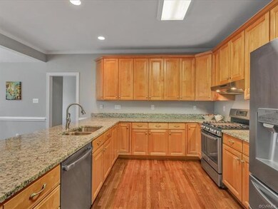 Kitchen with newer stainless appliances ~ refrigerator conveys! Gas cooking!