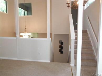 Split level view. Upstairs goes to master suite, a