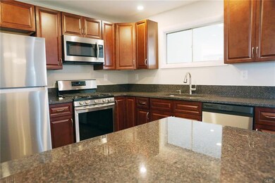 Gorgeous updated kitchen with breakfast bar