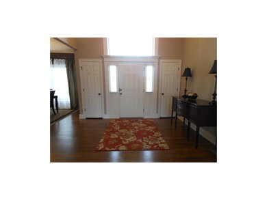 Light pours in through the transom window & side l