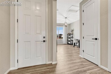 View of inside of front door and adjacent office -