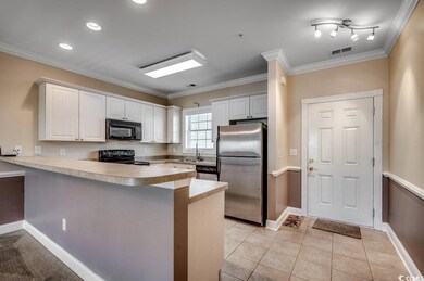 Kitchen with black appliances, kitchen peninsula, 