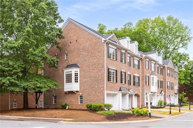 Stately end unit with convenient guest parking rig