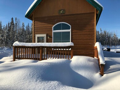 Front of cabin in winter