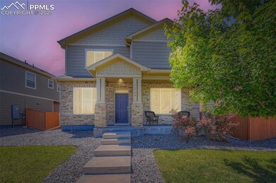 Craftsman inspired home with covered porch and stone siding