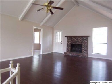 WOW!  HUGE Greatroom with gleaming hardwood floors