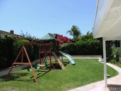 large backyard with plenty of space for kids, pets