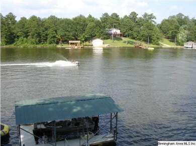 158 feet of year round water with covered dock and