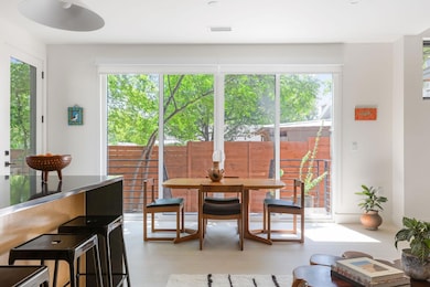 Dining space with light wood-type flooring