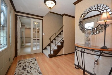From the foyer, explore the gracious living room j