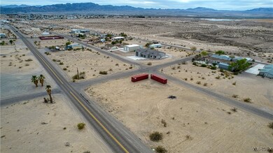 Aerial view featuring a rural view, a mountain view, and view of desert