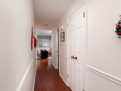 Walk down the hall to the 1st floor powder room an
