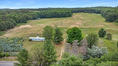 view from road with acreage and adjoinin