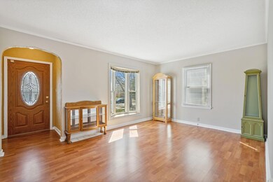 Light-filled living room with bay window