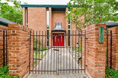 Gated front courtyard.  Let's head inside now