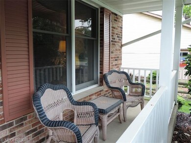 Charming front porch for early morning coffee or l