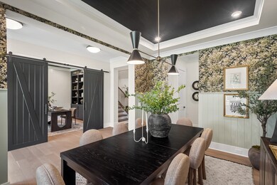 The formal Dining room makes a statement as guests enter through the front door. If a formal Dining room is not needed, this room can be used as another Home Office, Library or whatever need suits you. Photo is for informational purposes only.