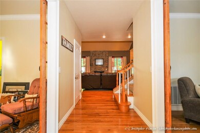 Formal dining and office both with barn doors as soon as you walk in.