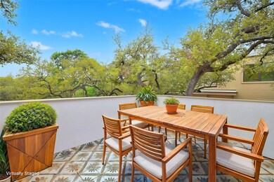 View of patio with outdoor dining area