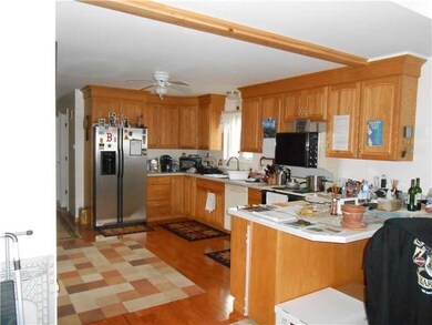 Kitchen. Breakfast Bar, SS Appliances, and Hardwoo