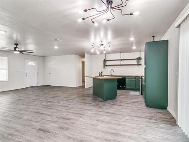 Kitchen featuring light hardwood / wood-style floo