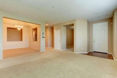 Living room, den and dining room