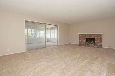 Living room with view towards the large patio room