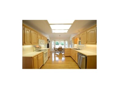 Gleaming Hardwood Flooring in Kitchen!