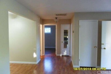 Hallway leading to dining area, bathroom and 2 bed