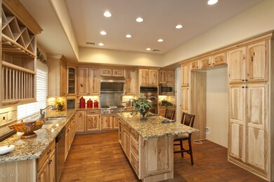 Kitchen with Island and Granite Counters