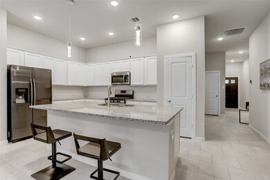 Another view of the kitchen