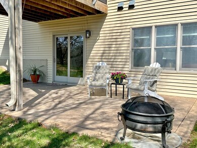 The back patio is a tranquil place to enjoy nature and chill.