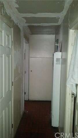 hallway to bedrm 2; laundry rm & bathrm rear of ho