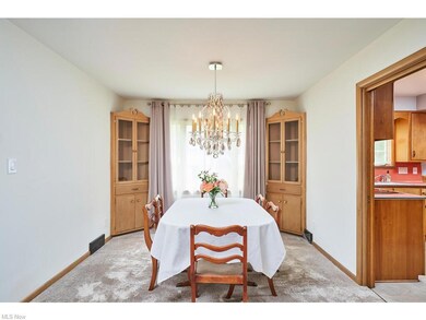 Dining Room with charming corner cabinets.