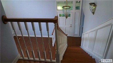 View from upstairs landing towards front door