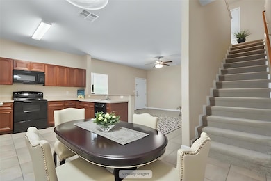 Dining room featuring light tile patterned floors