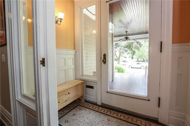 Entry vestibule has an original and elegant mosaic