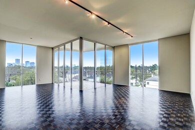 Corner Unit with Balcony and dark stained parquet