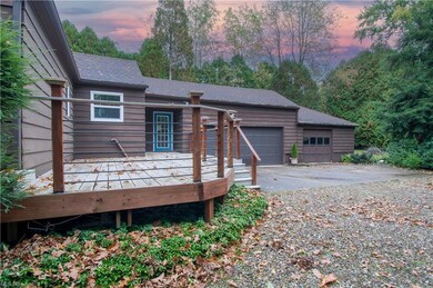 Large deck (29x14) and a three-car garage.