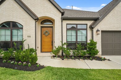 This impressive home features a spacious 3-car gar