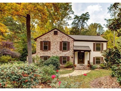 5 bedrooms & 3 full baths PLUS low maintenance bri