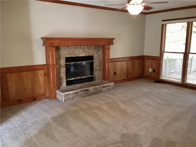 Family has custom paneling and built in shelves!
