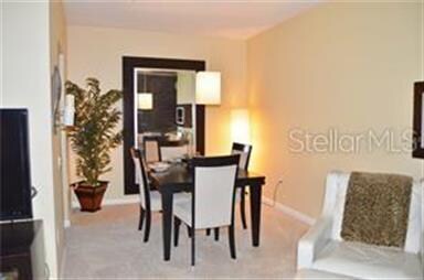 The formal dining room furnished.