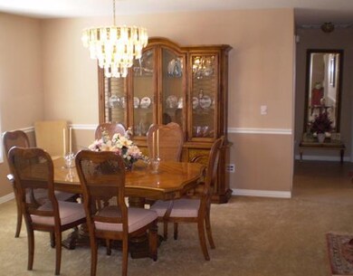 Dining Room. The dining room can handle plenty of furniture.