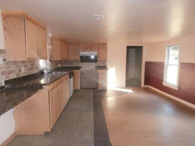 Large eat in Kitchen leading into...