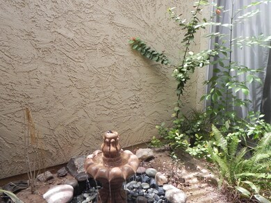 Tranquil fountain outside dining room