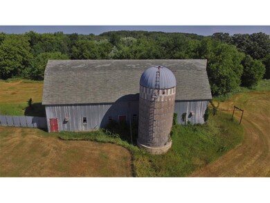 The barn is one of the many buildings on the prope