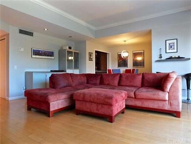 Living room, showing dining area and wet bar