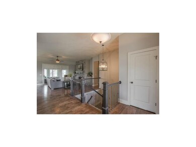 Spacious entry leads to open kitchen/hearth living
